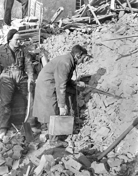 Framed Print : World War II: Hospital. Divining for Radium among the wreckage of what was the Marie