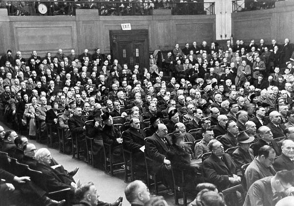 World War II: Medical. Audience of men listen carefully at a V. D. Conference