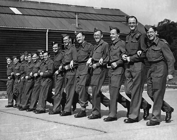 World War II. P. O. W. s. A line of soldiers who were repatriated back to the U. K