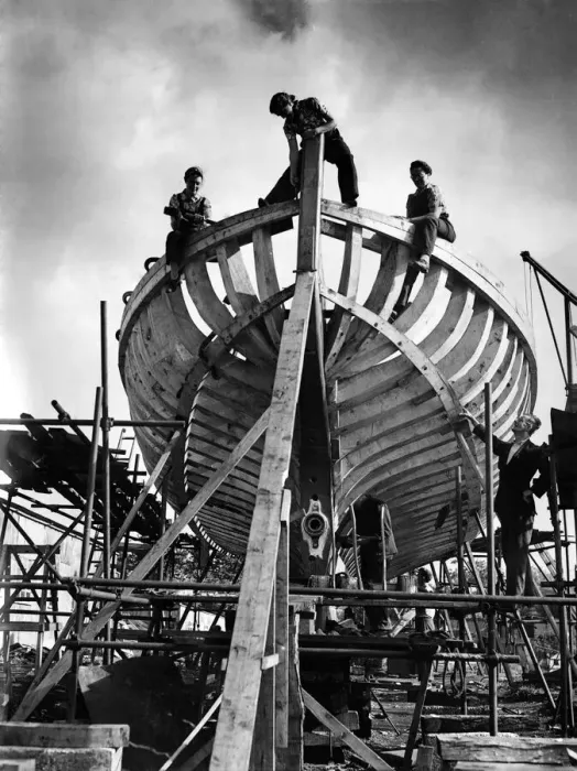 Framed Print : World War II: Ship Building. Women working on the stern of the seventh vessel to be built