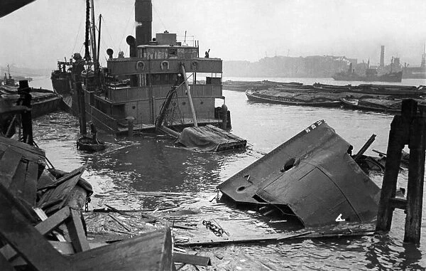 World War II: Shipping. This cargo steamer sank in the Thames yesterday