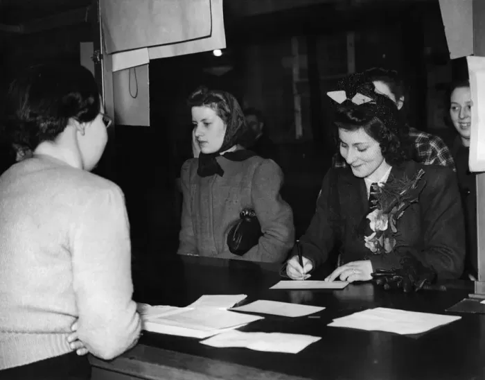 Framed Print : World War II Woman: Woman register for war work. April 1941 P010102