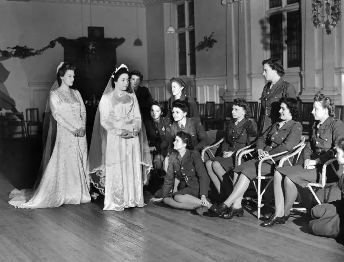Framed Print : World War II Women: Two A. T. S. girls trying out wedding dresses at a A. T. S. hostel Framed Print : World War II Women: Two A. T. S. girls trying out wedding dresses at a A. T. S. hostel