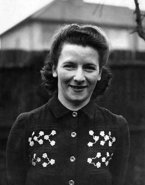 World War II Women: Fashions: Clothing. Mrs Vera Killick seen here modelling a embroided