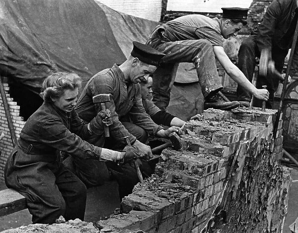 World War II: Women. Although left-handed, Phyllis does her bit with the hammer