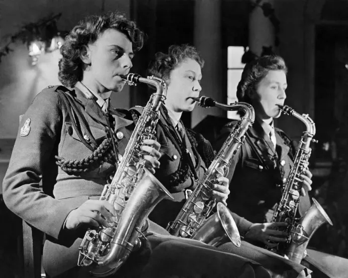 Framed Print : World War II Women. Three times the Sax. Three Sax players from the ATS dance band seen Framed Print : World War II Women. Three times the Sax. Three Sax players from the ATS dance band seen