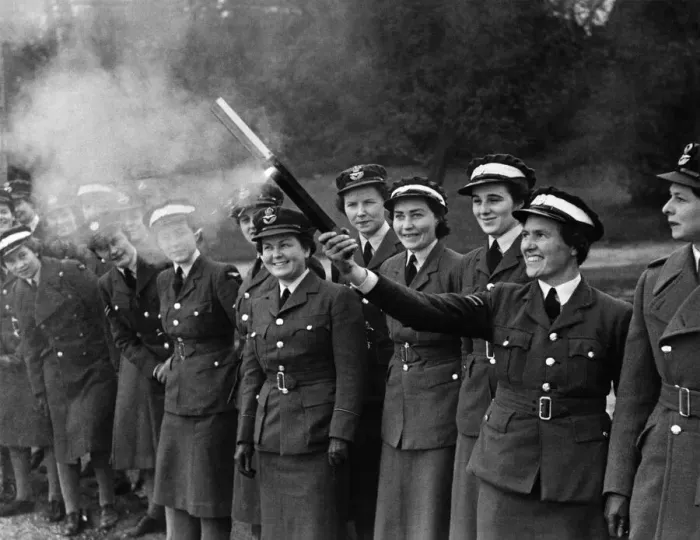 Framed Print : World War II Women: W. A. A. F.s in training. How to tackle an incendiary
