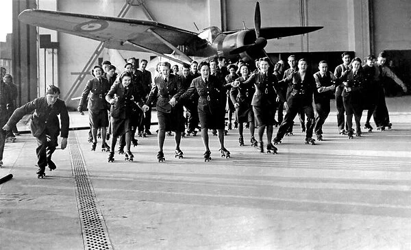 World War II Women. WaF and RAF ground crew seen here roller skating at their station a