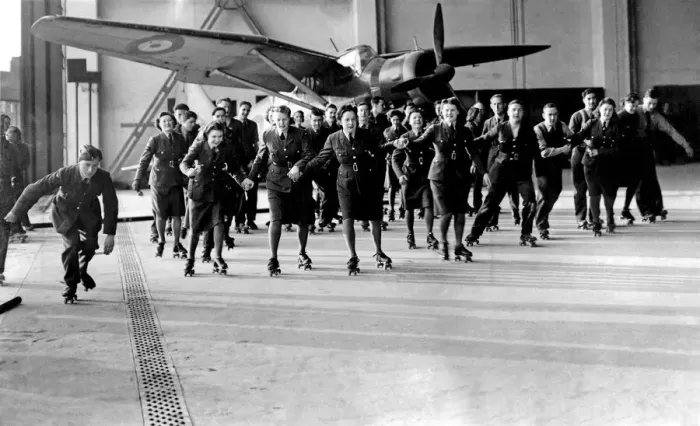 Framed Print : World War II Women. WaF and RAF ground crew seen here roller skating at their station a Framed Print : World War II Women. WaF and RAF ground crew seen here roller skating at their station a