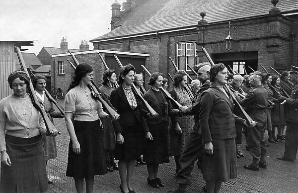 World War II Women: Women receive firearms training. from the Home GuardFeburary 1941
