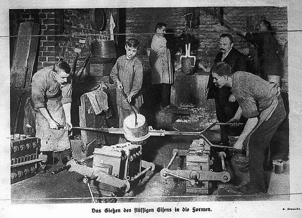 World War One Making Iron Cross medals October 1914 in Germany in The Foundry