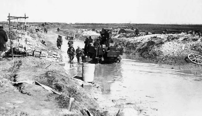 Framed Print : World War One mobile anti-aircraft gun is driven along a flooded road beside an Framed Print : World War One mobile anti-aircraft gun is driven along a flooded road beside an