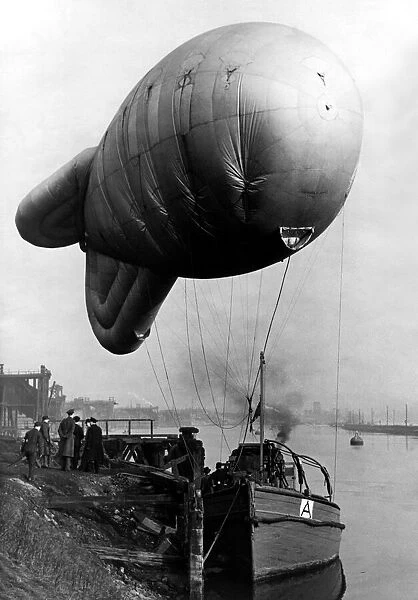 World War Two - Second World War - A barrage balloon on board a boat ready to help in