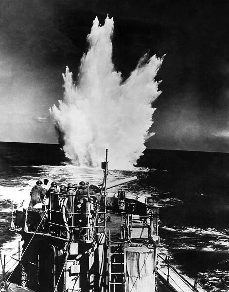 World War Two, Royal Navy destroyer drops depth charges on a German U-boat, April 1942