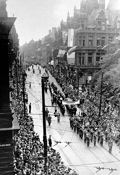 World War two victory parade - People find any vantage point they can to watch