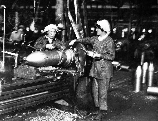 World War One WWI Munition factory making shells Women turning artillary