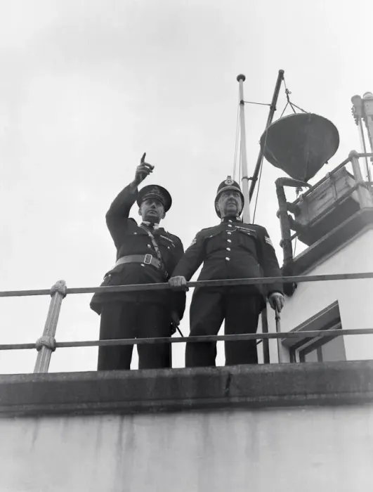 Framed Print : Worlds smallest police force - The five man Isle of Man harbour Police