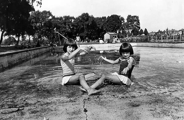 Would-be bathers Maureen, aged 10, and six-year-old Kathleen Armstrong
