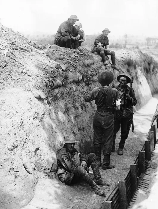 Framed Print : A wounded Australian soldier returning from the fighting telling his comrades the latest Framed Print : A wounded Australian soldier returning from the fighting telling his comrades the latest