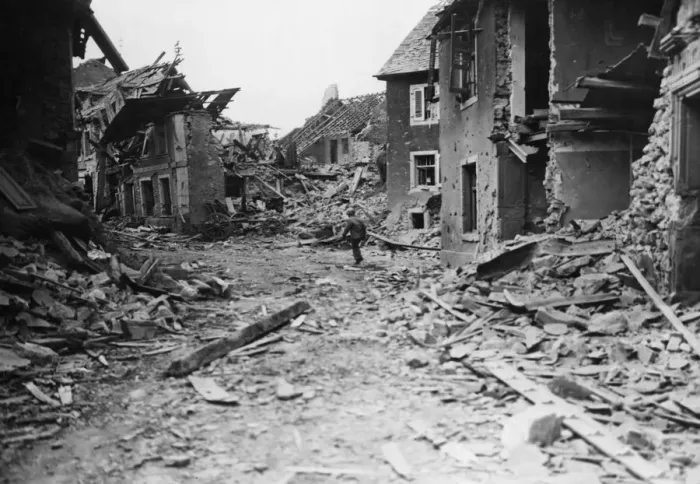 Framed Print : Wreckage wrought by American aircraft and artillery is noted by a US Third Army