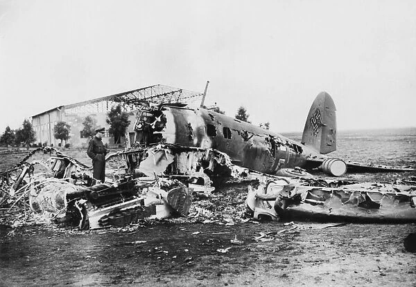 Wrecked German and Italian aircraft hangar outside Benghazi. 25th February 1941