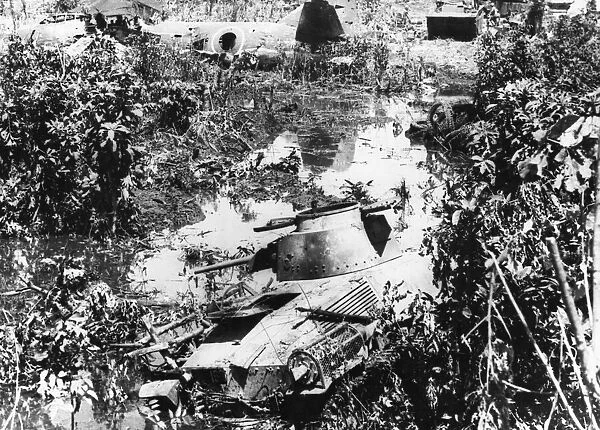 A wrecked Japanese tank on the island of Peleliu after its capture by US marines during