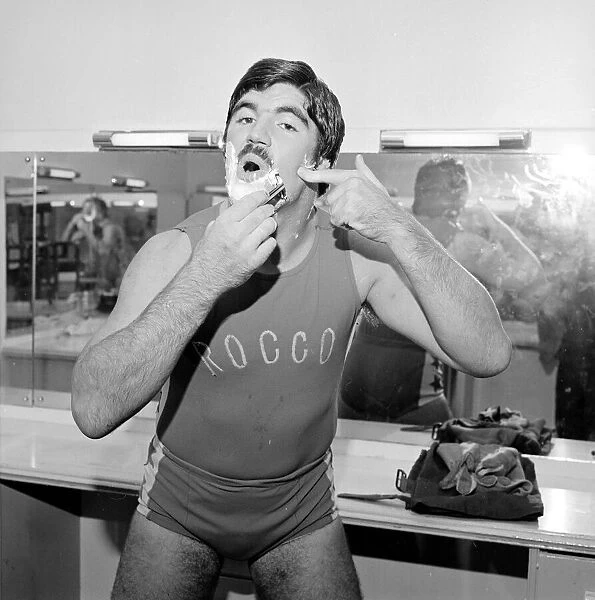 Wrestler Mark Rollerball Rocco seen here taking a shave before a bout November 1978