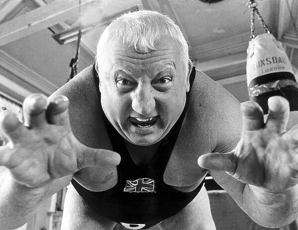 Wrestler Shirley Crabtree alias Big Daddy poses in the gym, July 1979
