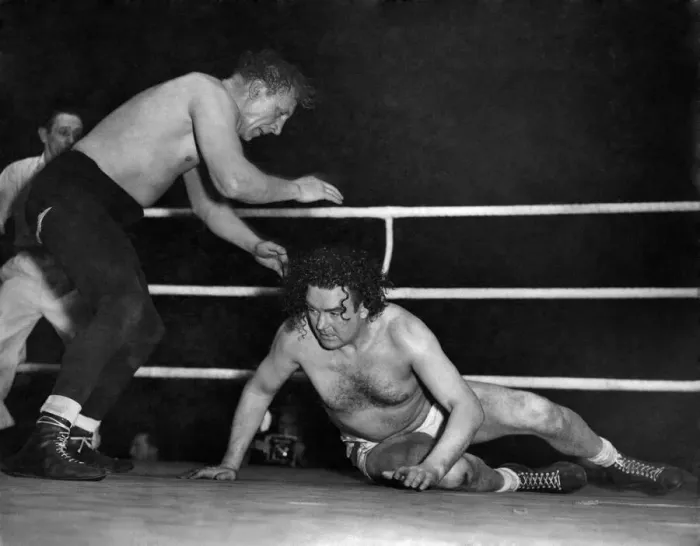 Framed Print : Wrestling match at Harringay. Jack Doyle in white trunks in action against Eddie Phillips Framed Print : Wrestling match at Harringay. Jack Doyle in white trunks in action against Eddie Phillips