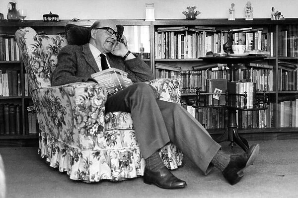 Writer Sid Chaplin, pictured sitting in a chair. Circa 1983