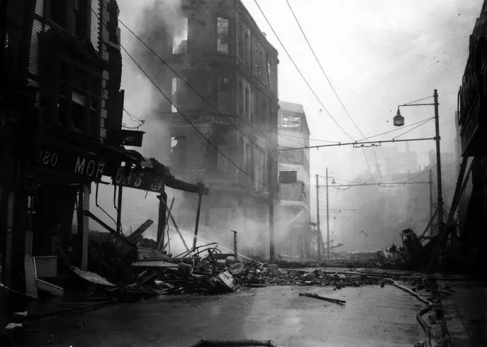 Framed Print : WW2 Air Raid Bomb Damage Portsmouth 1940 A firmens hose plays water on to