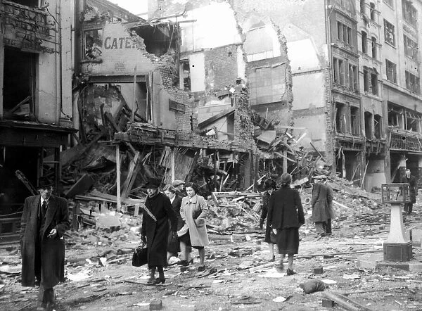 WW2 Air Raid Damage April 1941 Bomb damage in London People clear the streets