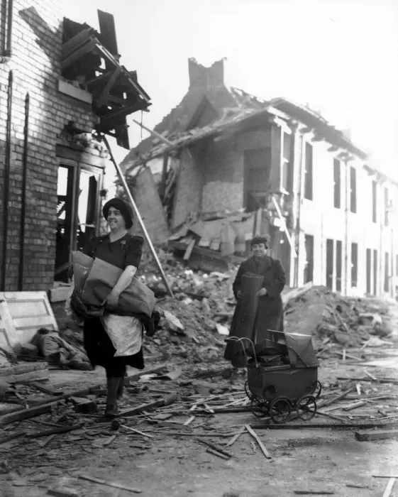 Framed Print : WW2 Air Raid Damage Bomb damage in Newcastle Civilians walk along the street