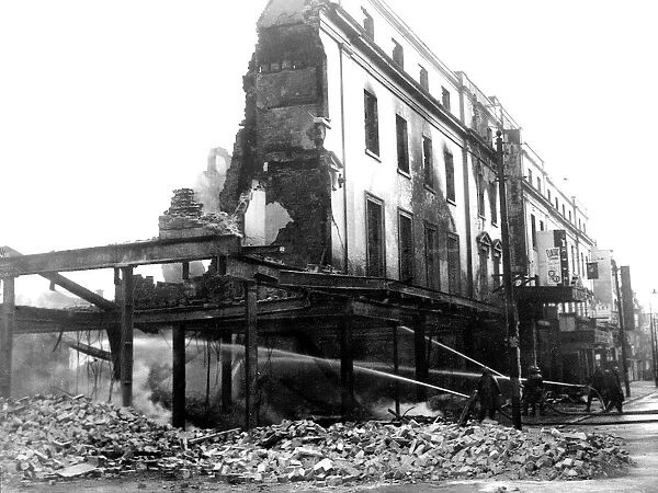 WW2 Air Raid Damage Bomb damage at Southampton, Firefighters put out fire after