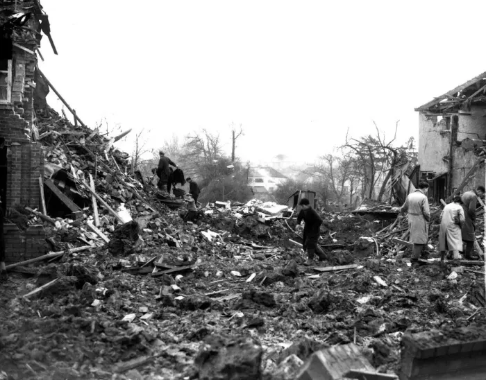 Framed Print : WW2 Air Raid Damage Bristol Civilians searching through rubble of their bomb
