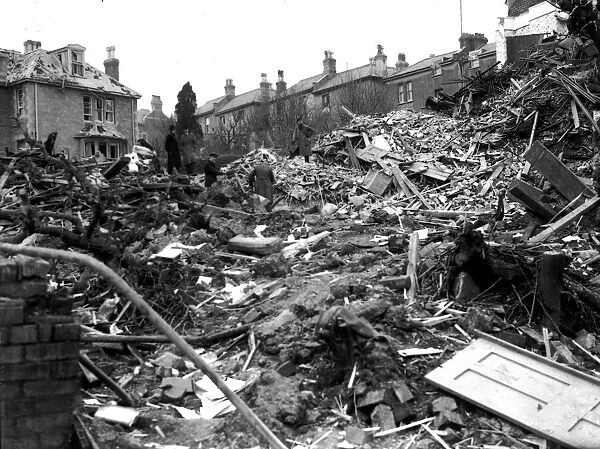 WW2 Air Raid Damage Coventry Civilians search the rubble of thier bomb damaged
