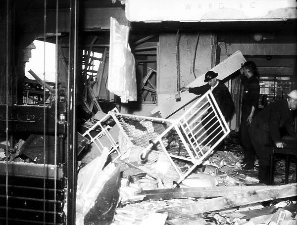 WW2 Air Raid Damage Rescue team searching through a bombed hospital ward during