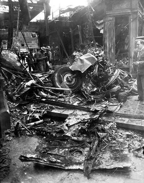 WW2 Air Raid Damage Soldiers examine debris after the blitz