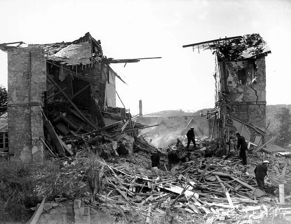 WW2 Air Raid Damage at Yarmouth, Norfolk, East Anglia. Rescue team searching