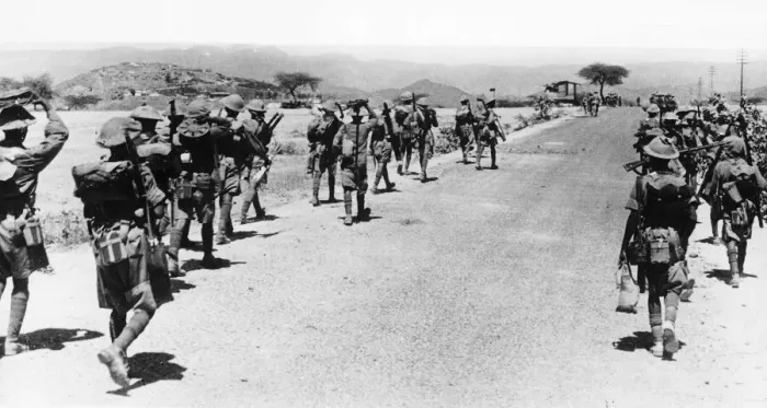 Framed Print : WW2 British and Indian troops seen marching towards Keren Framed Print : WW2 British and Indian troops seen marching towards Keren
