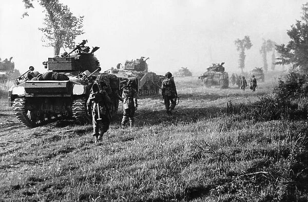 WW2 British Troops advance east of Caen 1944