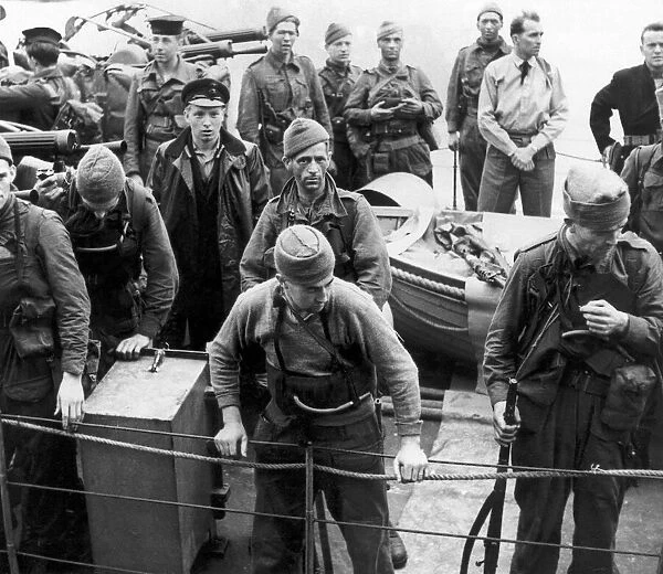 WW2 British troops disembark after returning from the biggest ever Combined Operations