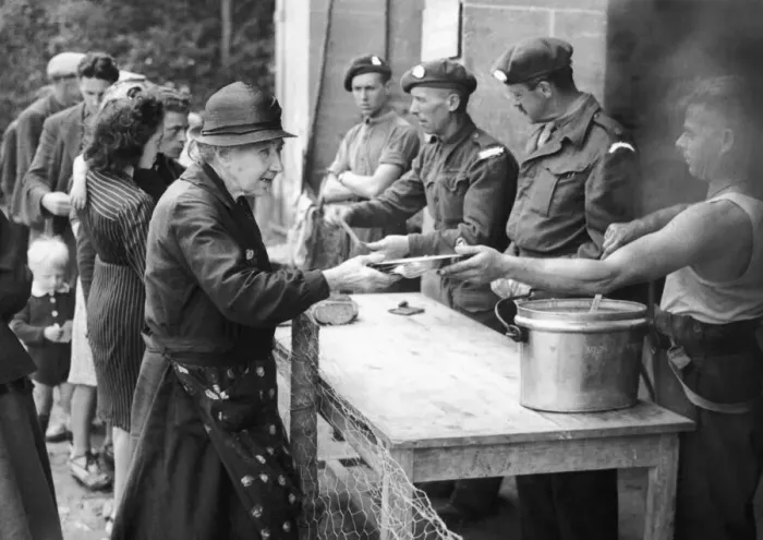 Framed Print : WW2 British troops serving refugees in the liberated town of Bayuex, Normandy Framed Print : WW2 British troops serving refugees in the liberated town of Bayuex, Normandy