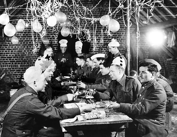 WW2 Christmas for British troops December 1939 in France Pulling crackers after