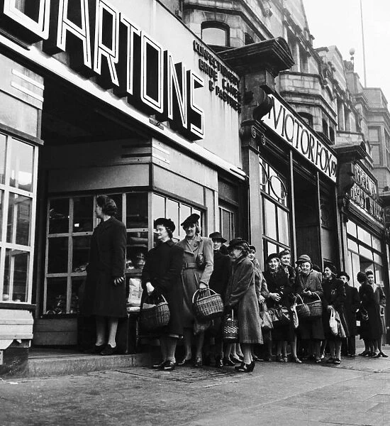 WW2 First Queue of the day people wait for hot bread