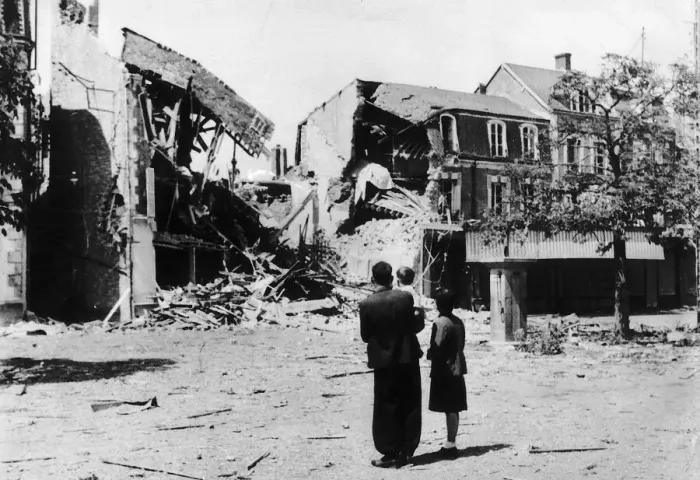 Framed Print : WW2 Invasion Refugees 1944 A family return to the home among the battlefields Framed Print : WW2 Invasion Refugees 1944 A family return to the home among the battlefields