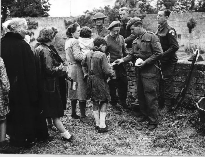 Framed Print : WW2 - June 1944 French refugees receiving food from British troops