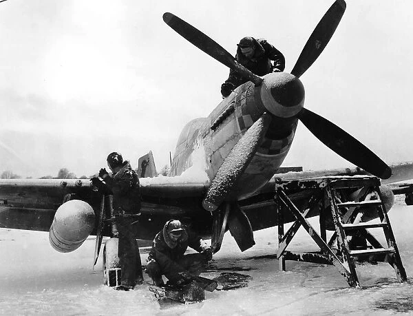 WW2 North American P51 Mustang January 1945 being maintained by the ground repair