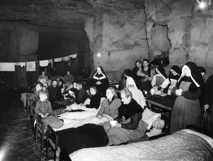 Framed Print : WW2 Refugees from Caen in quarries 1944 The photograph shows refugees from Caen Framed Print : WW2 Refugees from Caen in quarries 1944 The photograph shows refugees from Caen