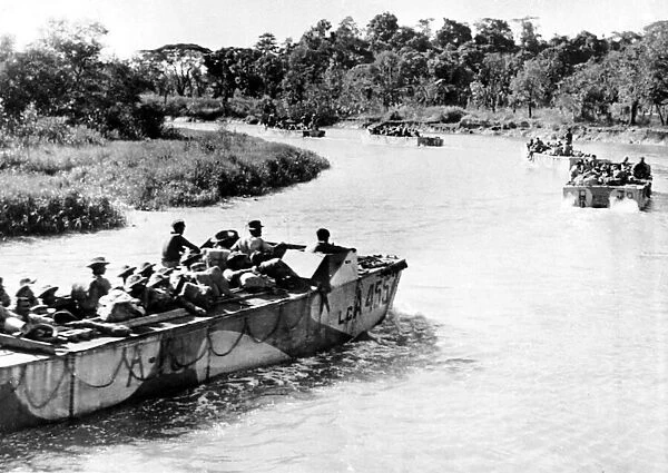 WW2 RIN landing craft carry Indian January 1945 soldiers along a tributary near